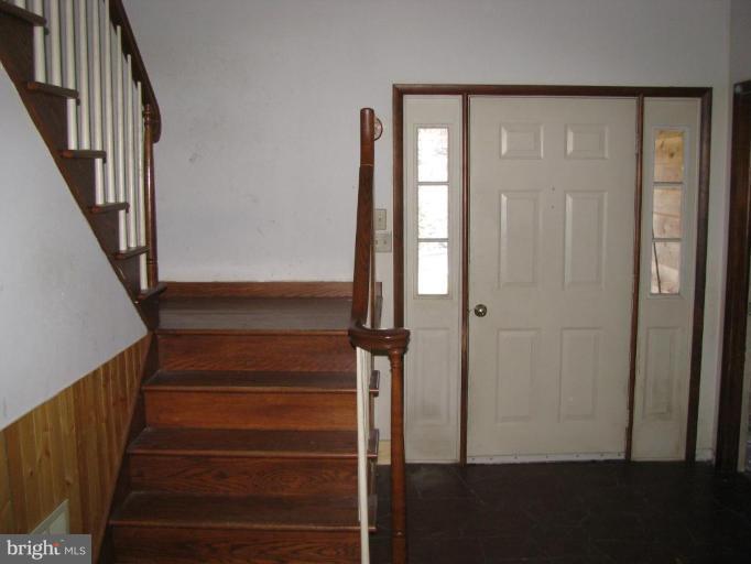 514 Redland Road Cross Junction, VA 22625 - Photo 8 of 24 a view of entryway with wooden floor and stairs