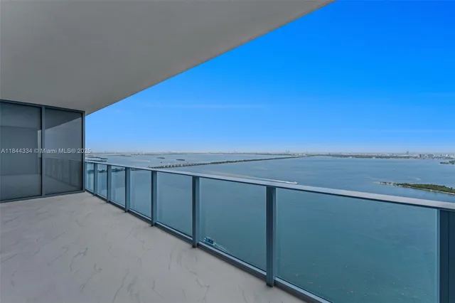 a view of a lake with a outdoor space