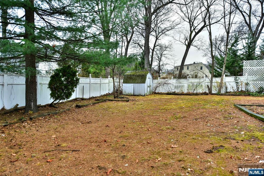 34 Summit Avenue Waldwick, NJ 07463 - Photo 15 of 16 a view of a backyard with large trees