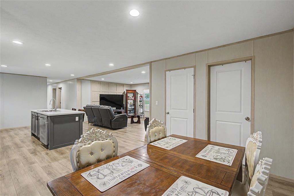 6065 Timber Trail Azle, TX 76020 - Photo 12 of 33 a living room with furniture and a couch
