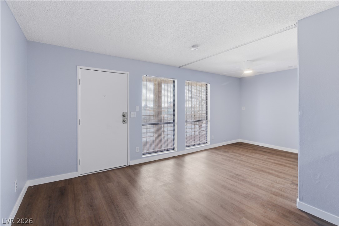 2221 West Bonanza Road, Unit 28 Las Vegas, NV 89106 - Photo 4 of 15 This bright living area features sleek wood flooring and ample natural light.