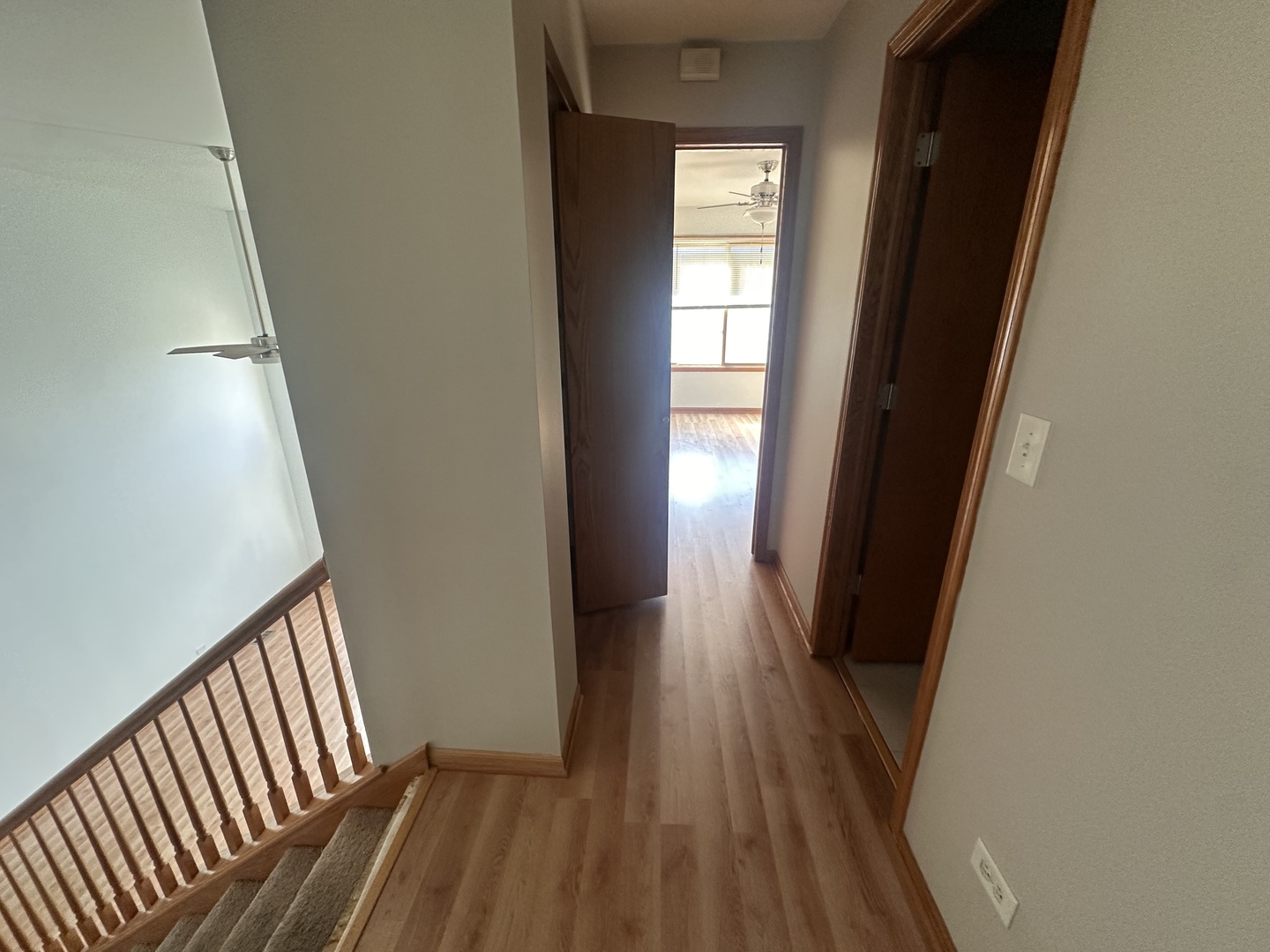 26358 South Evergreen Lane Channahon, IL 60410 - Photo 20 of 28 a view of a hallway view with wooden floor and staircase