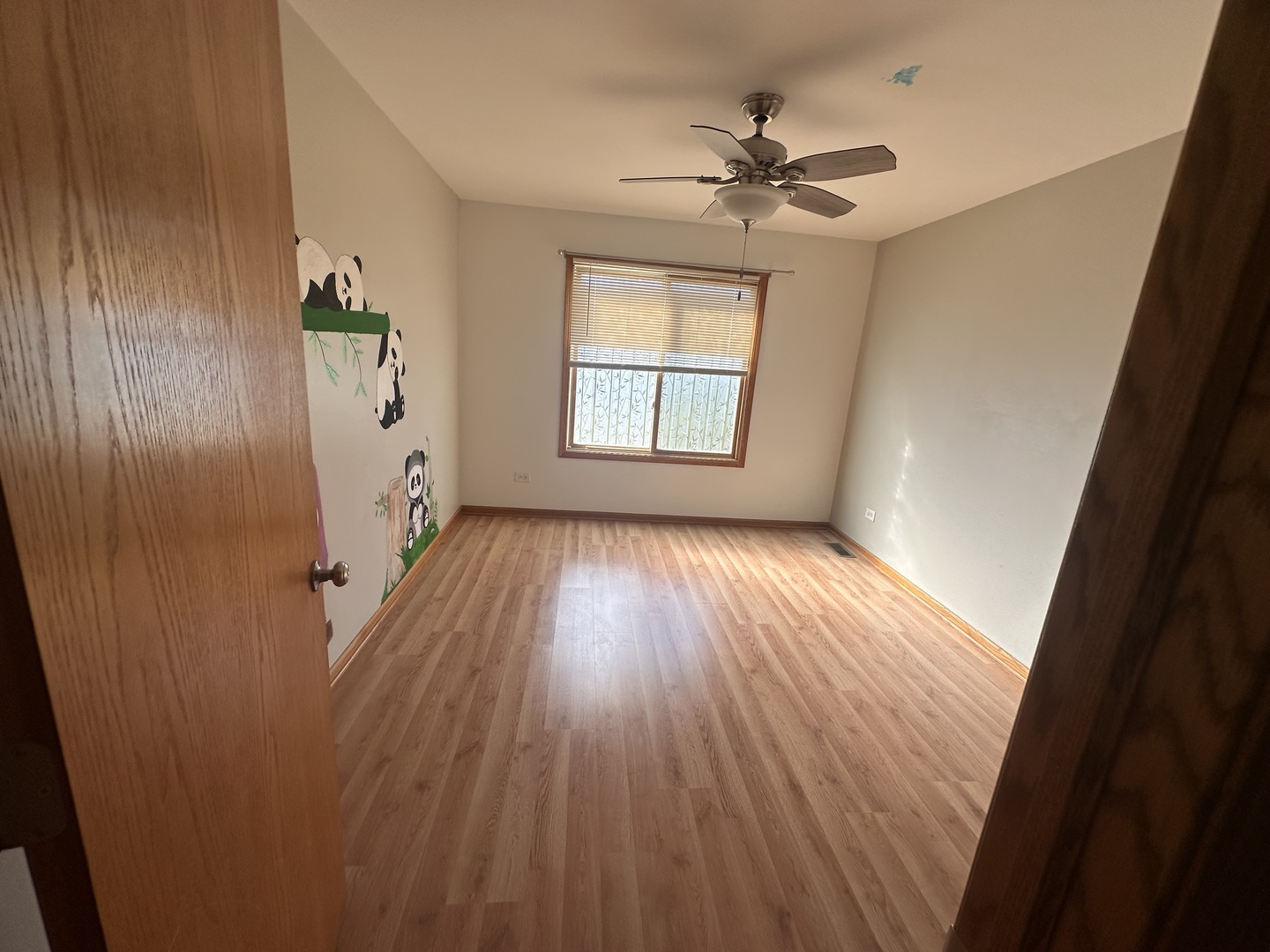 26358 South Evergreen Lane Channahon, IL 60410 - Photo 21 of 28 wooden floor in an empty room with a window
