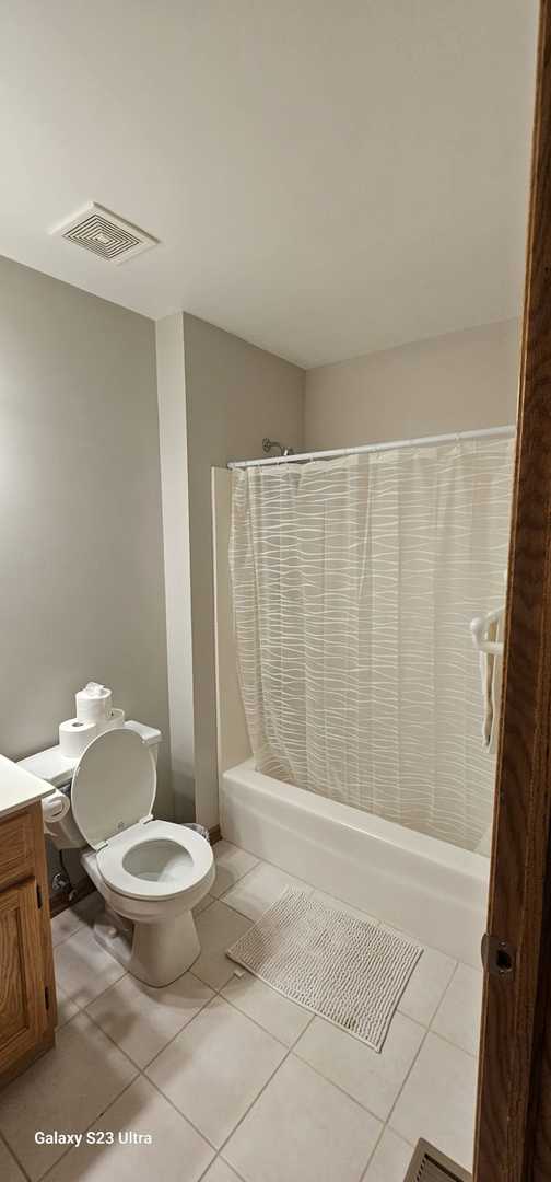 26358 South Evergreen Lane Channahon, IL 60410 - Photo 23 of 28 a bathroom with a toilet and a shower