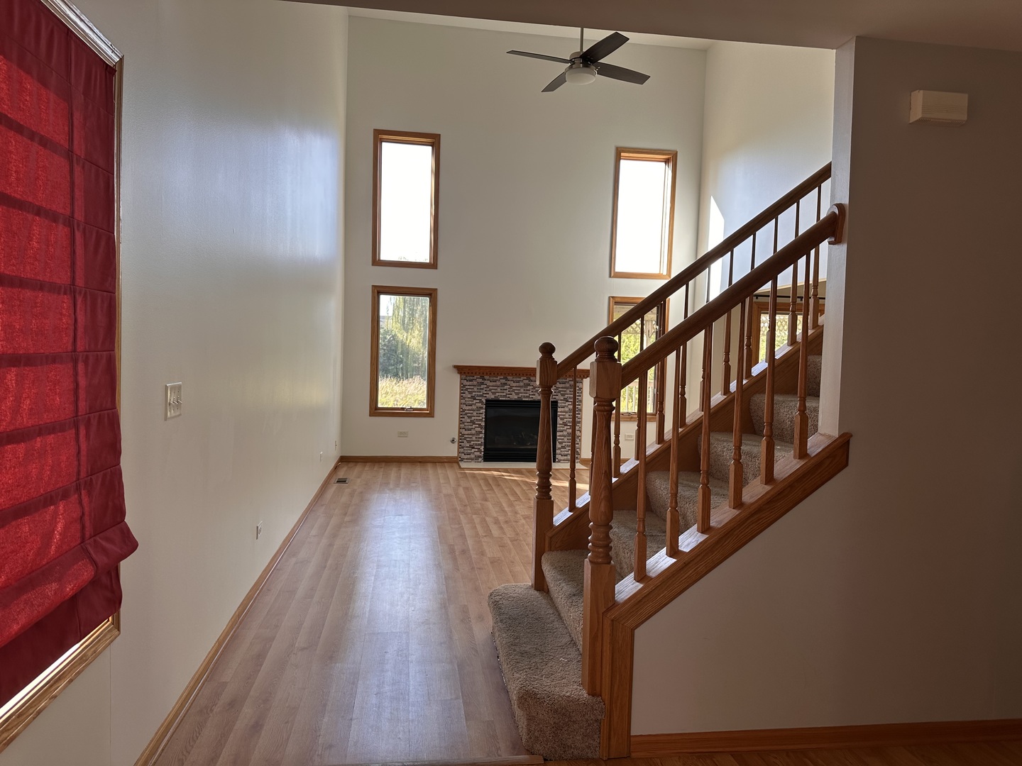 26358 South Evergreen Lane Channahon, IL 60410 - Photo 8 of 28 a view of an entryway with wooden floor and stairs