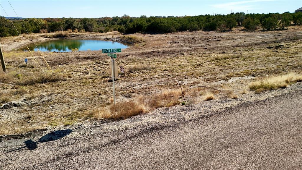 0 Bison Ridge Stephenville, TX 76401 - Photo 4 of 9 a view of lake with mountain