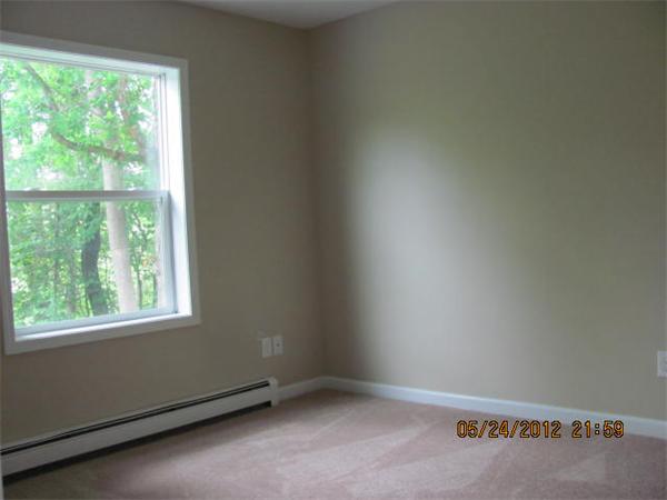 167 Fitch Road Clinton, MA 01510 - Photo 14 of 26 an empty room with a window