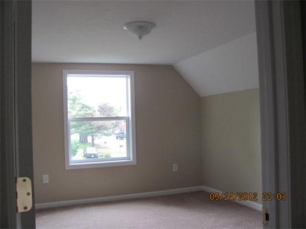 167 Fitch Road Clinton, MA 01510 - Photo 20 of 26 an empty room with a window