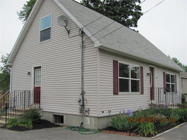 167 Fitch Road Clinton, MA 01510 - Photo 4 of 26 a view of a house with a yard