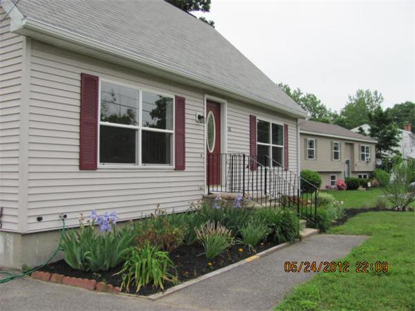 167 Fitch Road Clinton, MA 01510 - Photo 5 of 26 a front view of a house with garden