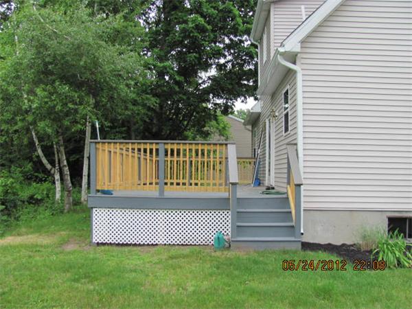 167 Fitch Road Clinton, MA 01510 - Photo 6 of 26 a view of a back yard of the house