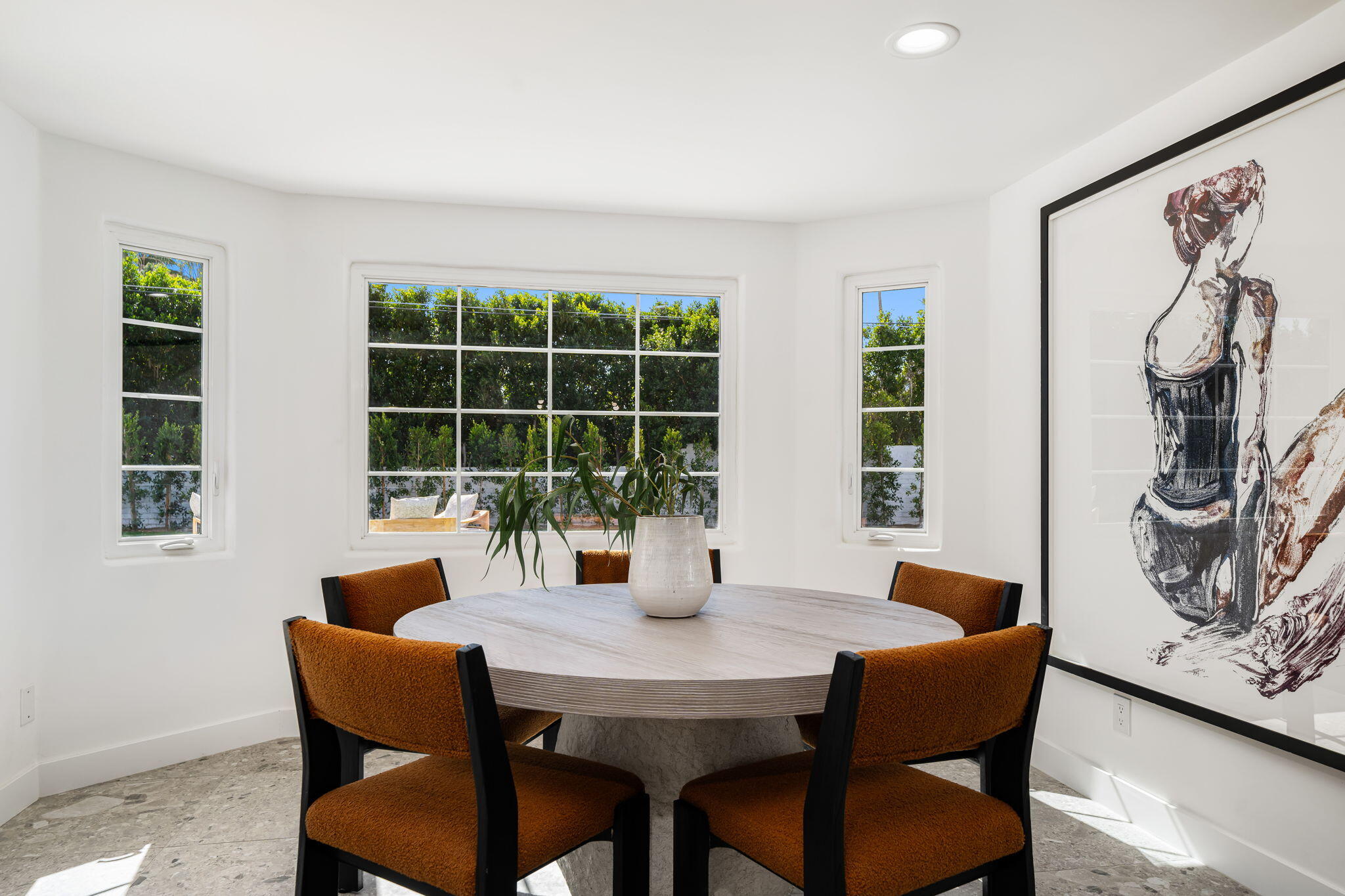 1037 Tamarisk Road Palm Springs, CA 92262 - Photo 11 of 31 a dining room with furniture and window
