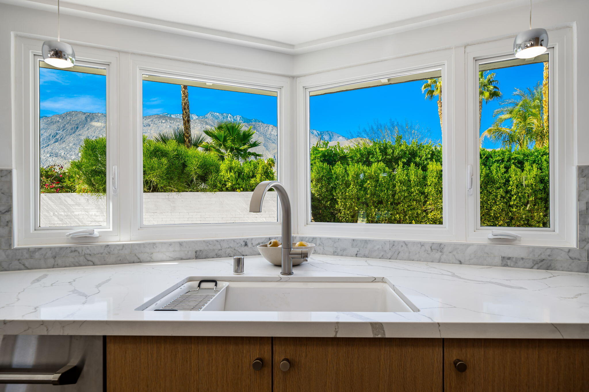 1037 Tamarisk Road Palm Springs, CA 92262 - Photo 14 of 31 a sink with a window