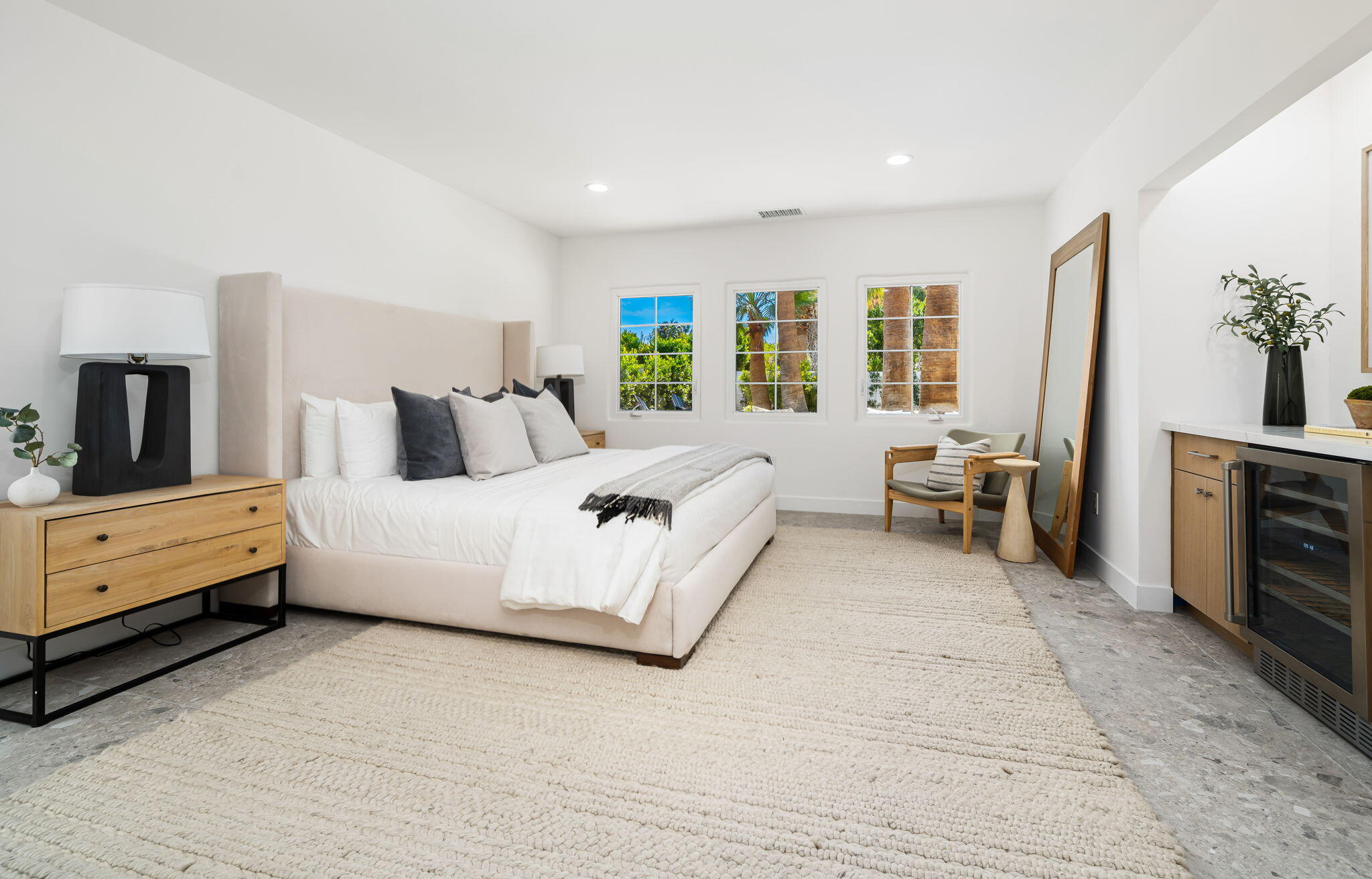 1037 Tamarisk Road Palm Springs, CA 92262 - Photo 16 of 31 a bed room with furniture and a fireplace
