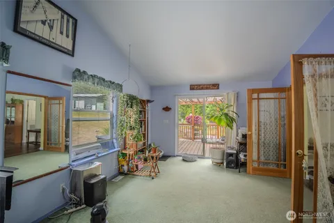 a room with furniture and a large window