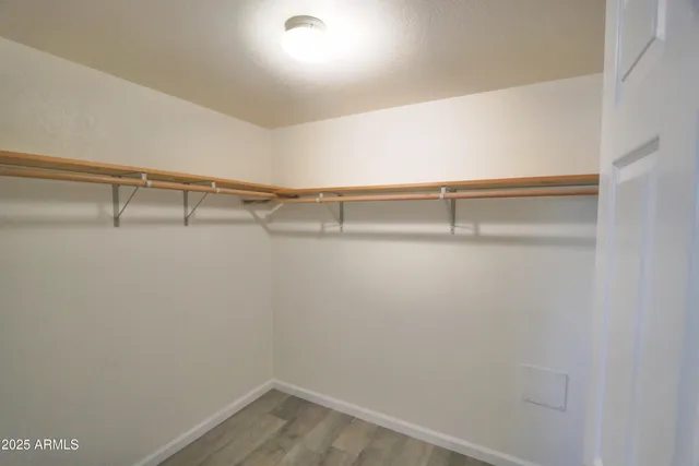 a view of a room with racks on the wall