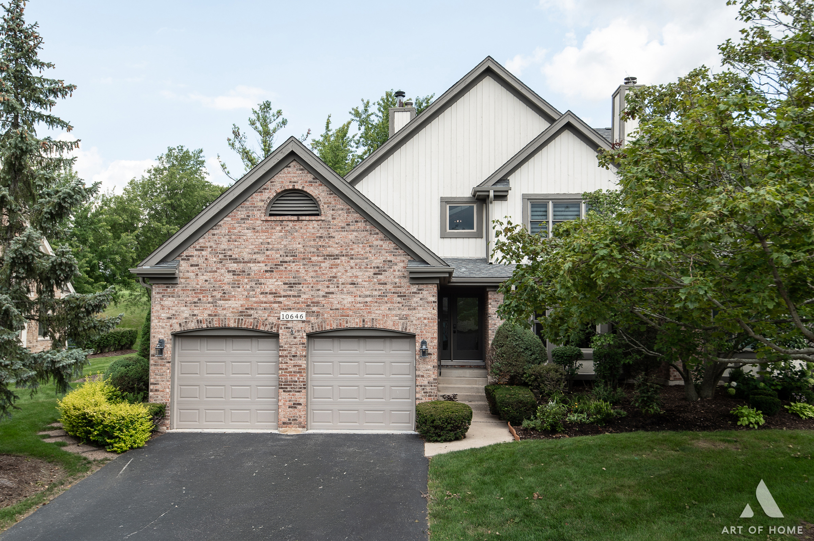 10646 Golf Road Orland Park, IL 60462 - Photo 2 of 55 a front view of a house with a yard and garage