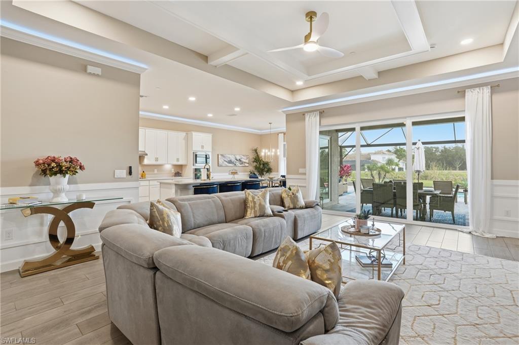 17120 Serengeti Circle Alva, FL 33920 - Photo 12 of 50 a living room with furniture and view of kitchen