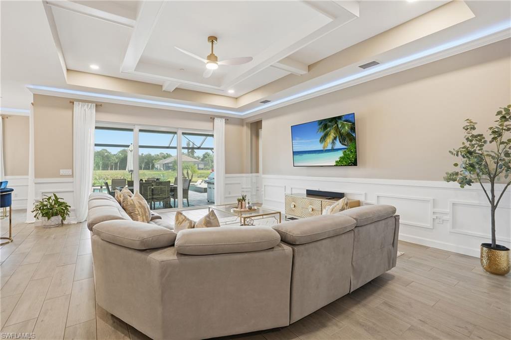 17120 Serengeti Circle Alva, FL 33920 - Photo 13 of 50 a living room with furniture and a large window