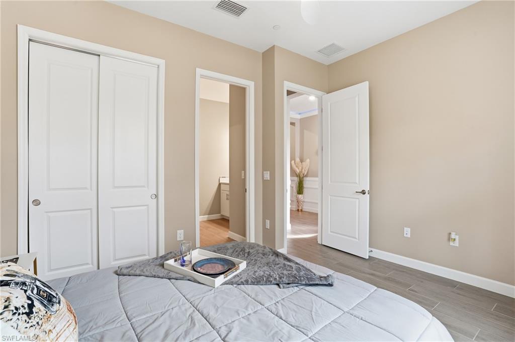 17120 Serengeti Circle Alva, FL 33920 - Photo 30 of 50 a bedroom with a bed and a window