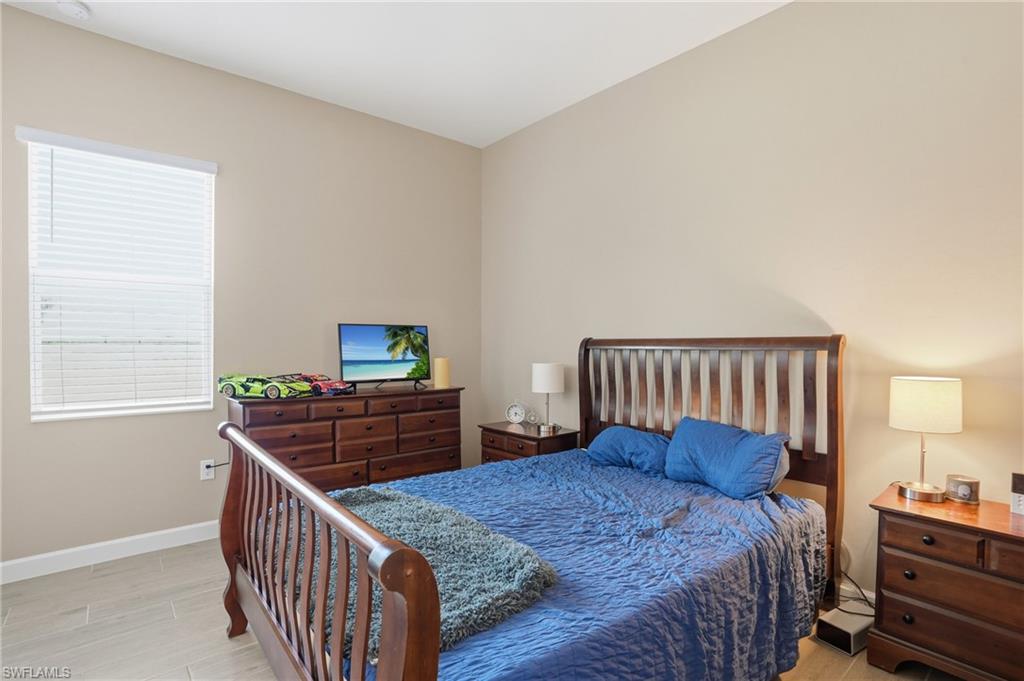 17120 Serengeti Circle Alva, FL 33920 - Photo 32 of 50 a bedroom with a bed and a window