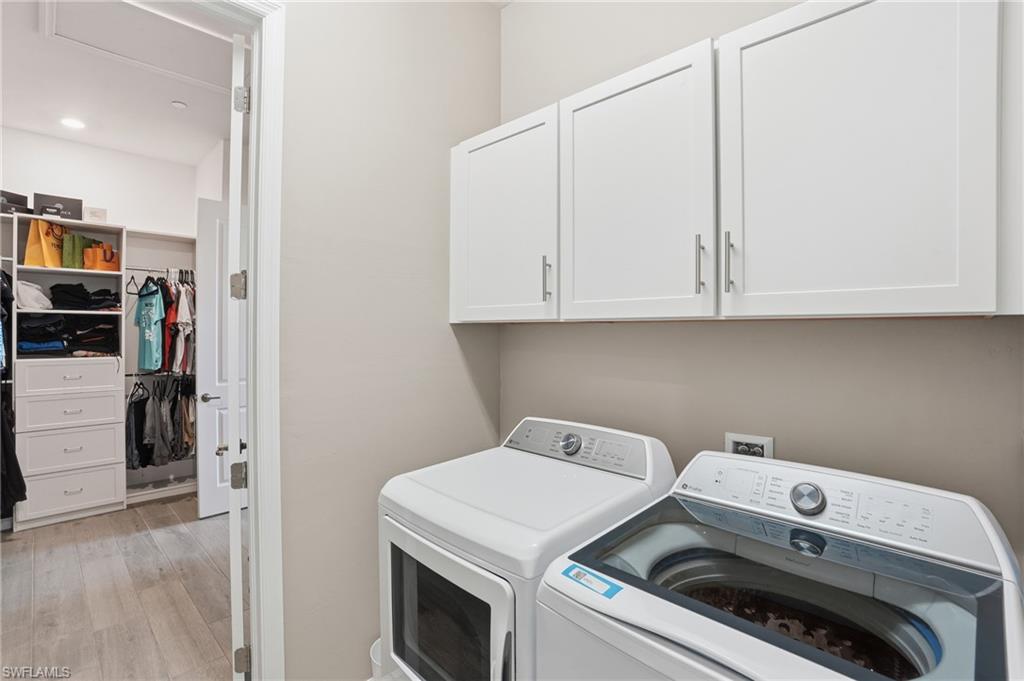 17120 Serengeti Circle Alva, FL 33920 - Photo 35 of 50 a utility room with dryer and washer