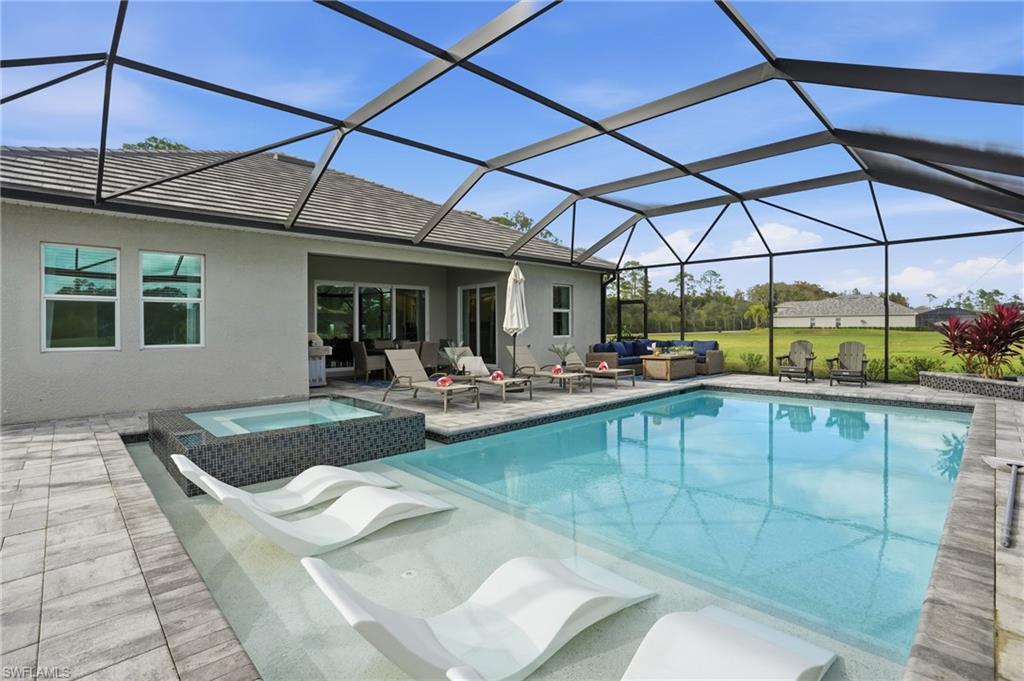 17120 Serengeti Circle Alva, FL 33920 - Photo 40 of 50 a view of a swimming pool with a patio