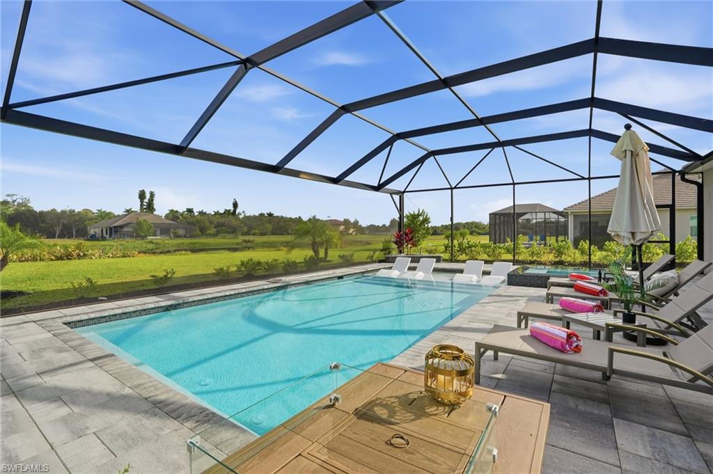 17120 Serengeti Circle Alva, FL 33920 - Photo 42 of 50 a view of a swimming pool with a patio