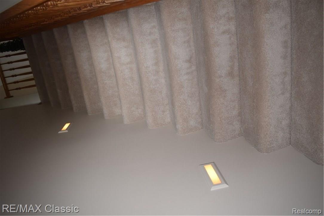 9495 Quail Ridge Run Brighton, MI 48114 - Photo 52 of 85 Lighted Staircase!