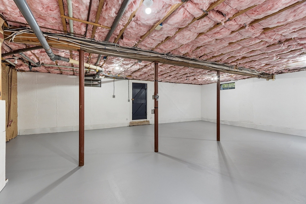 707 Sterling Road Lancaster, MA 01523 - Photo 36 of 40 a view of a room with wooden walls