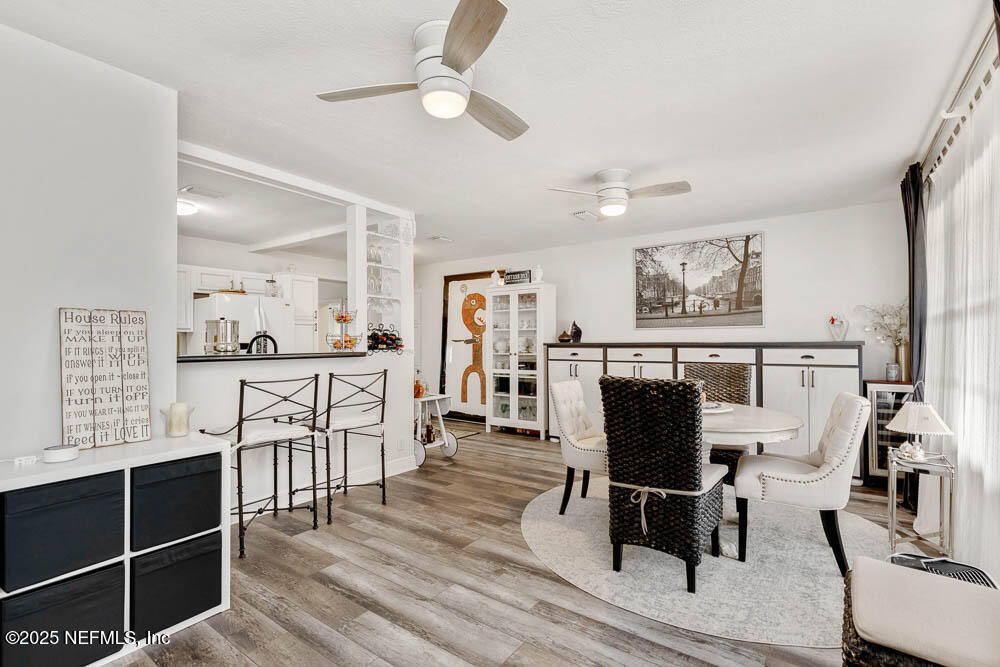 1228 Glen Laura Road Jacksonville, FL 32205 - Photo 3 of 40 a view of a livingroom with furniture and a flat screen tv