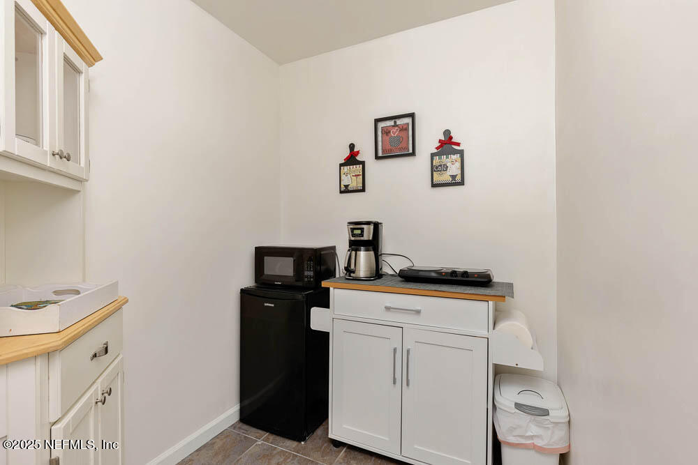 1228 Glen Laura Road Jacksonville, FL 32205 - Photo 32 of 40 a room with storage and utility