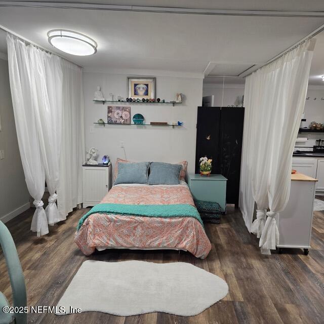 1228 Glen Laura Road Jacksonville, FL 32205 - Photo 39 of 40 a bedroom with a bed and a window