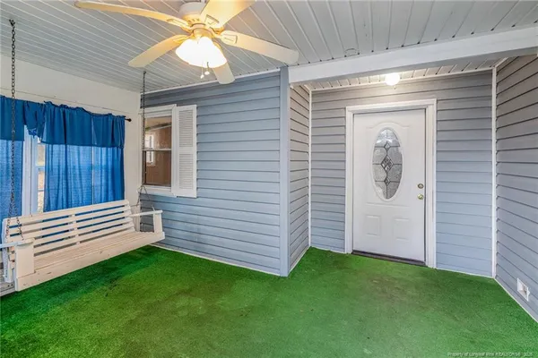 a view of a door and a window