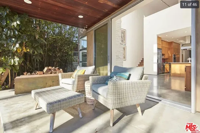 a outdoor living space with furniture and a potted plant