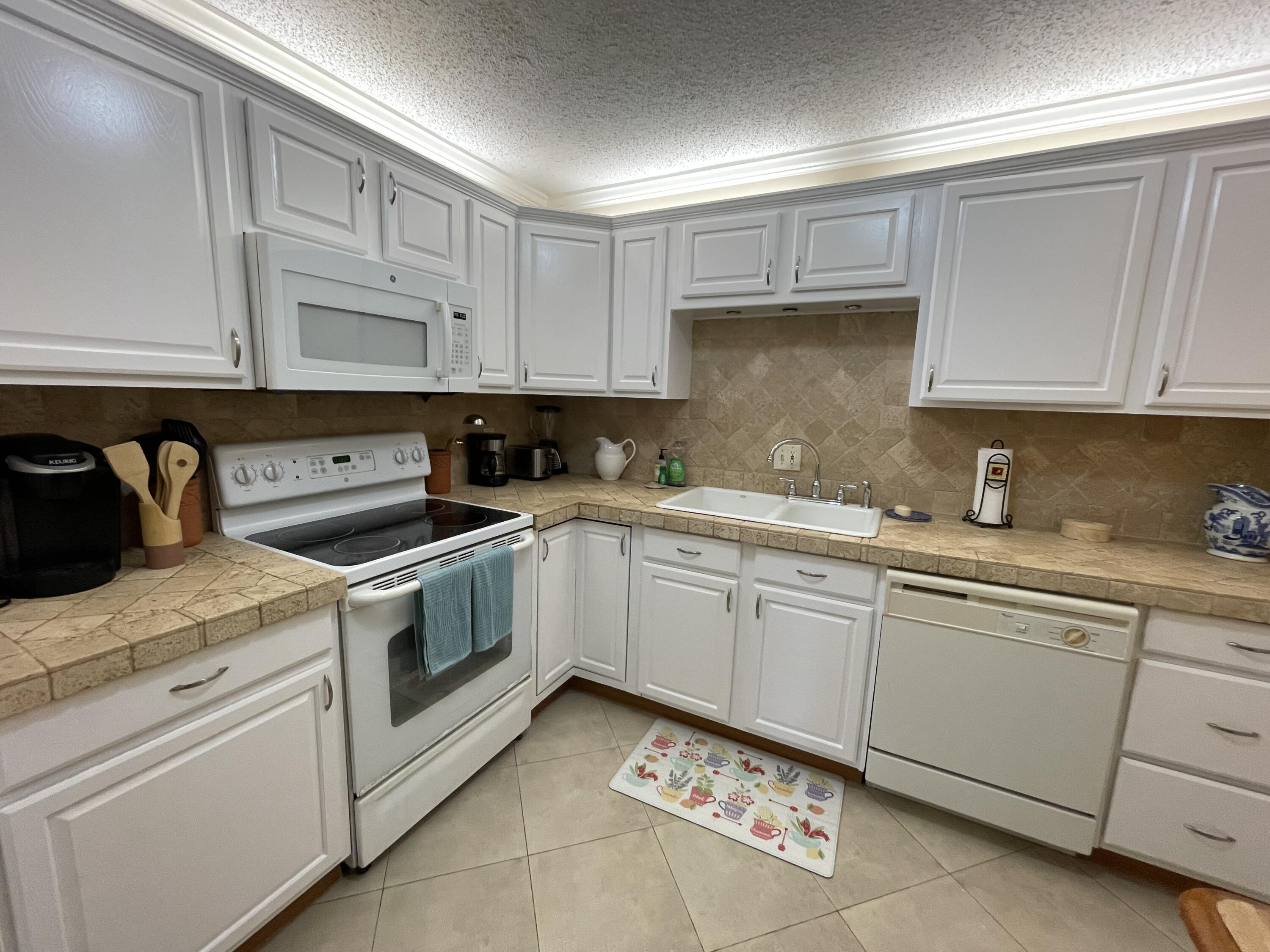 22765 Southwest 66th Avenue, Unit 101 Boca Raton, FL 33428 - Photo 13 of 35 IMG_1988