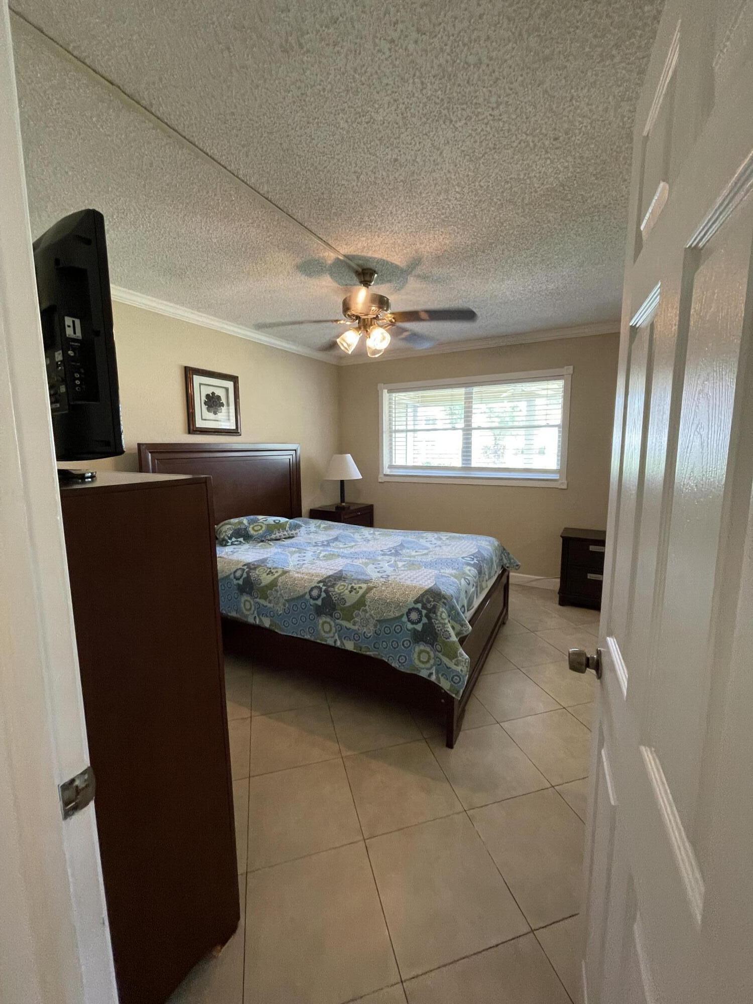 22765 Southwest 66th Avenue, Unit 101 Boca Raton, FL 33428 - Photo 15 of 35 IMG_1989