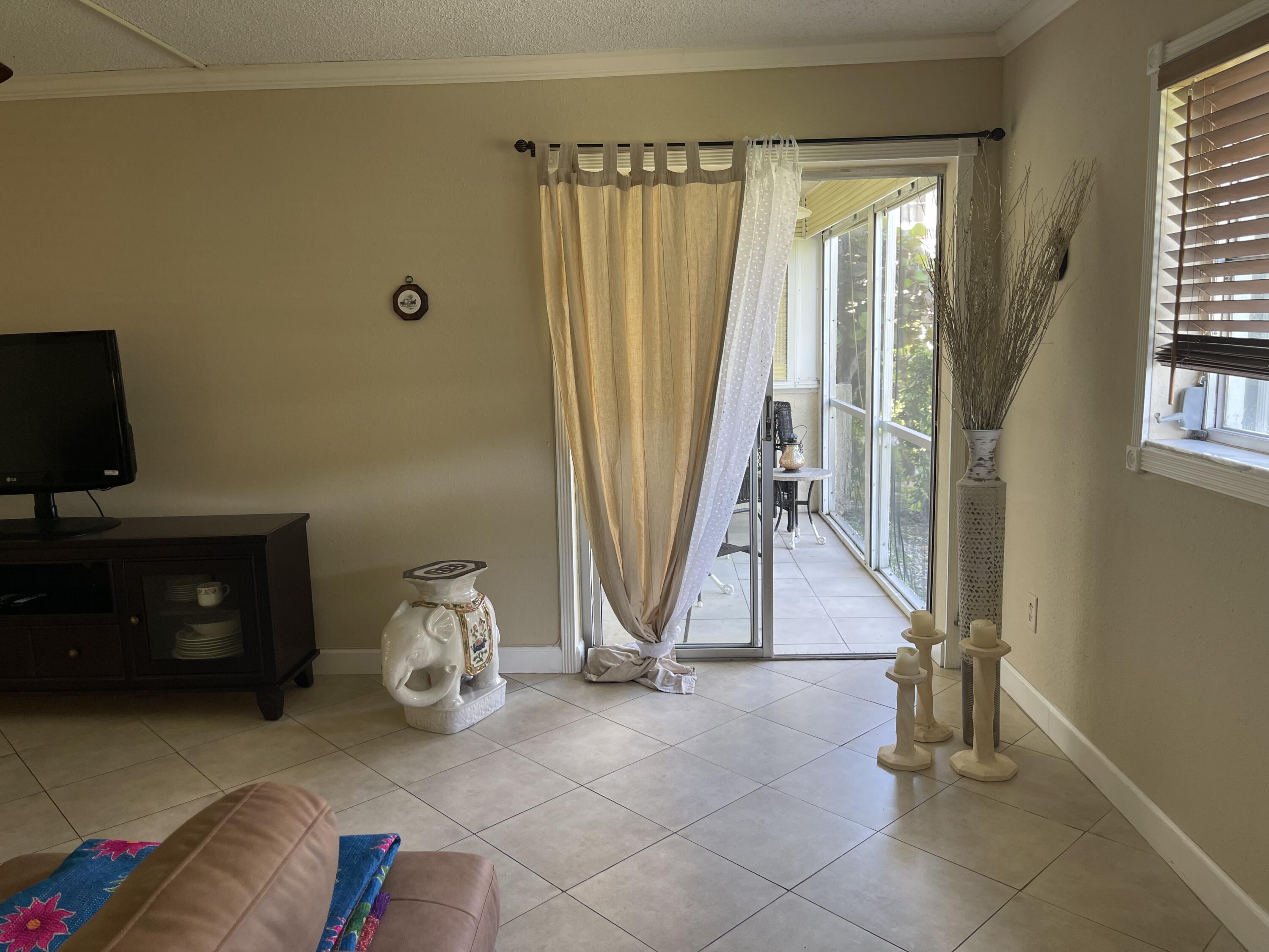 22765 Southwest 66th Avenue, Unit 101 Boca Raton, FL 33428 - Photo 8 of 35 IMG_2099