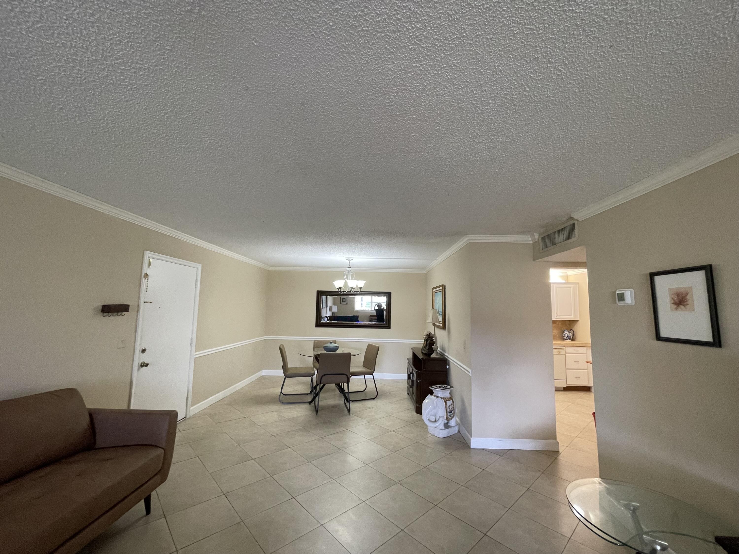 22765 Southwest 66th Avenue, Unit 101 Boca Raton, FL 33428 - Photo 9 of 35 IMG_1997 (1)