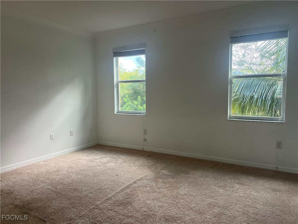 10132 Via Colomba Circle Fort Myers, FL 33966 - Photo 7 of 15 an empty room with a window