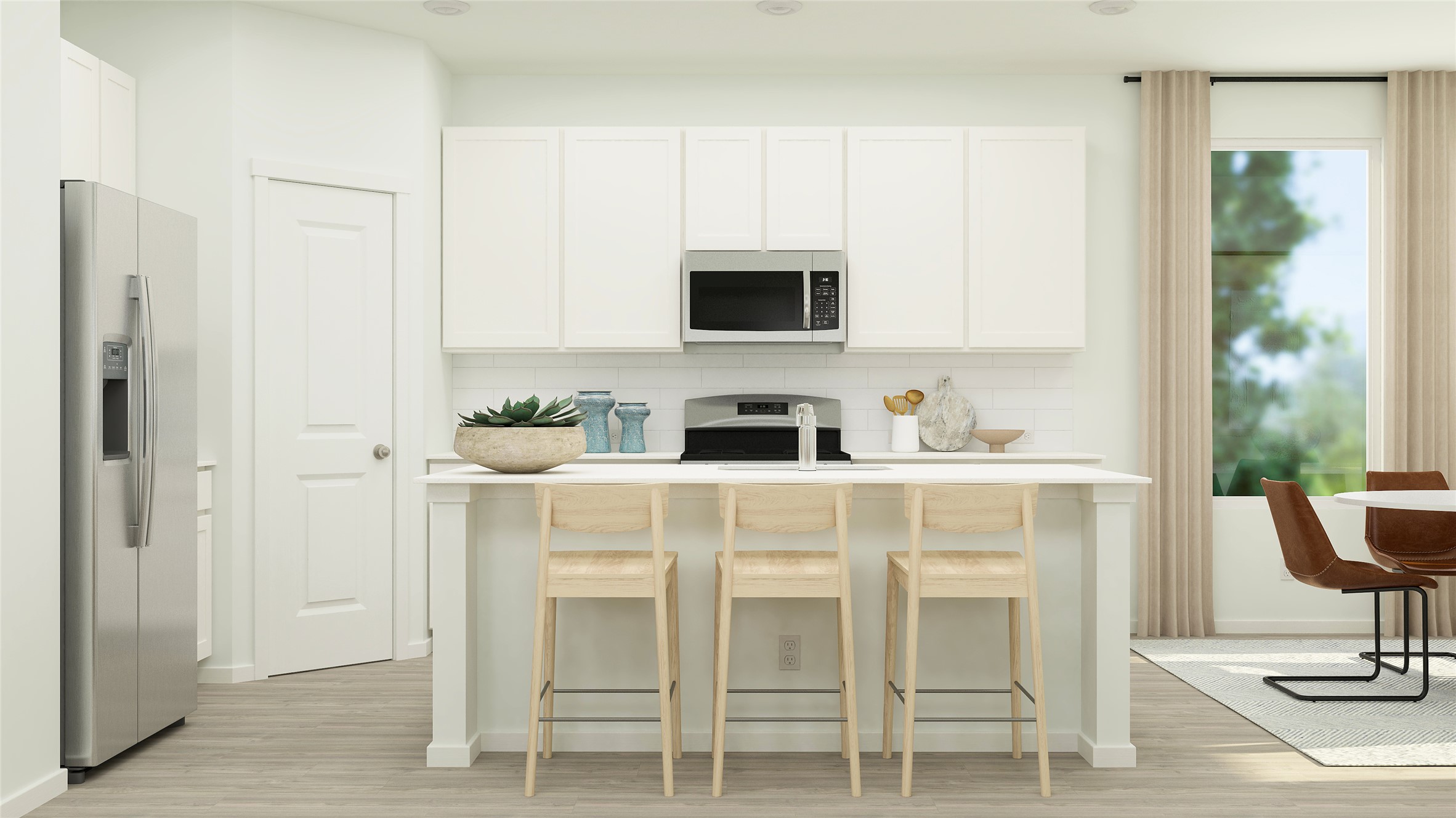 17917 Nashville Warbler Road Pflugerville, TX 78660 - Photo 13 of 24 a white kitchen with a stove a sink and white cabinets