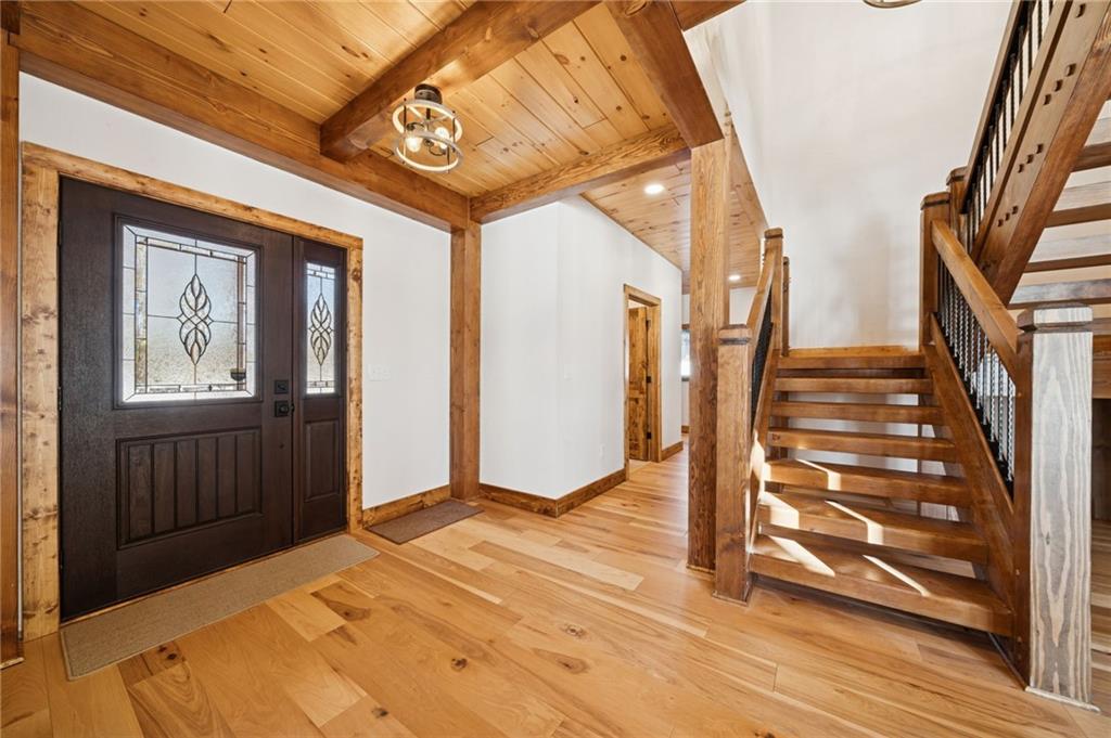223 Deer Fern Drive Somerset, PA 15501 - Photo 7 of 37 a view of an entryway with wooden floor and door