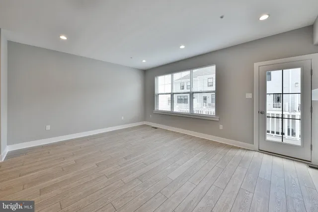 a view of a kitchen with a sink and a fireplace