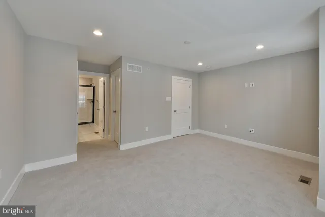 a view of a room with racks on the wall