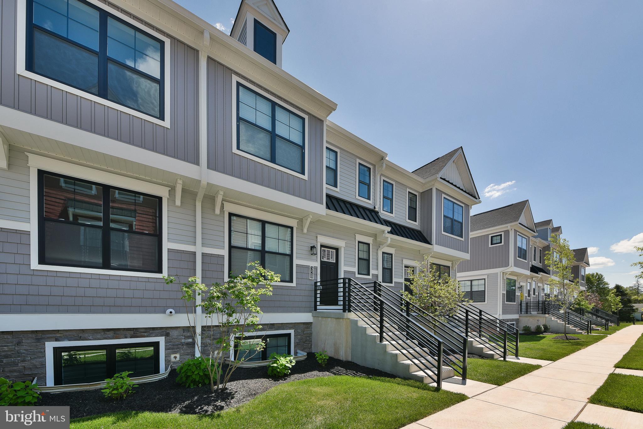 328 Walnut Street Collegeville, PA 19426 - Photo 2 of 35 a front view of a house with yard and green space