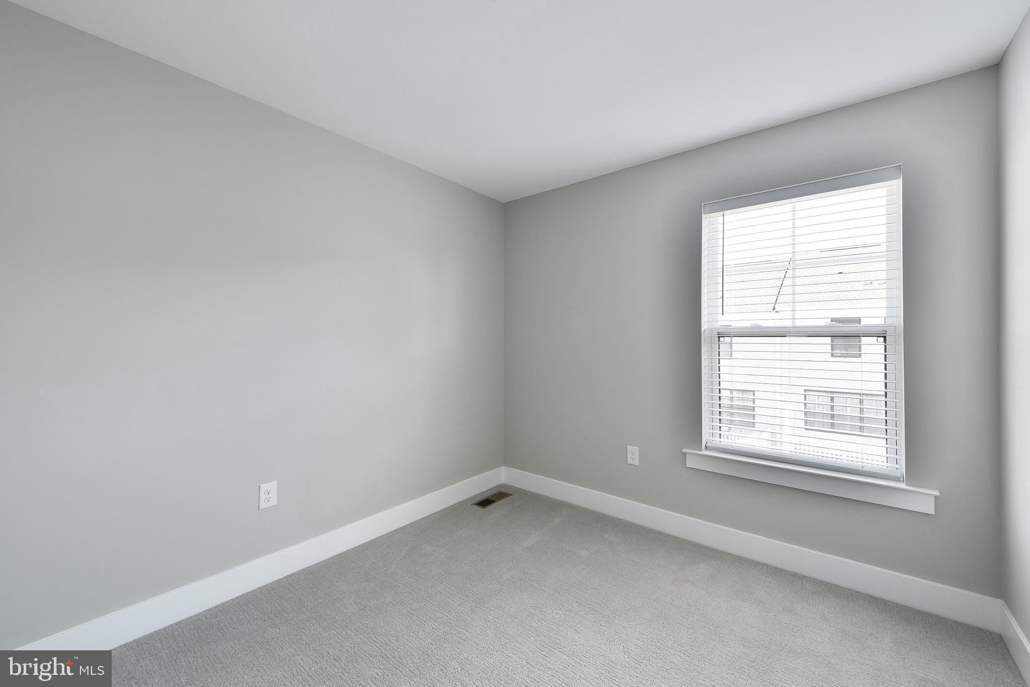 328 Walnut Street Collegeville, PA 19426 - Photo 21 of 35 an empty room with a window