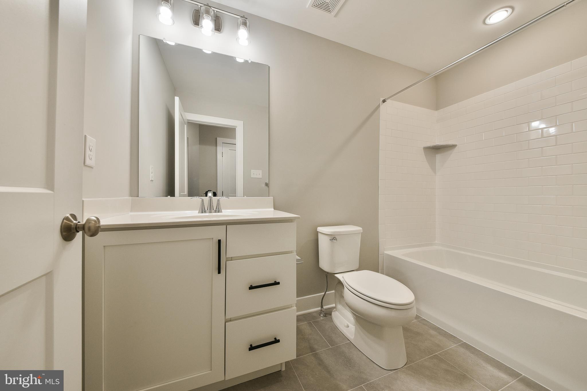 328 Walnut Street Collegeville, PA 19426 - Photo 25 of 35 a bathroom with a sink a toilet and shower