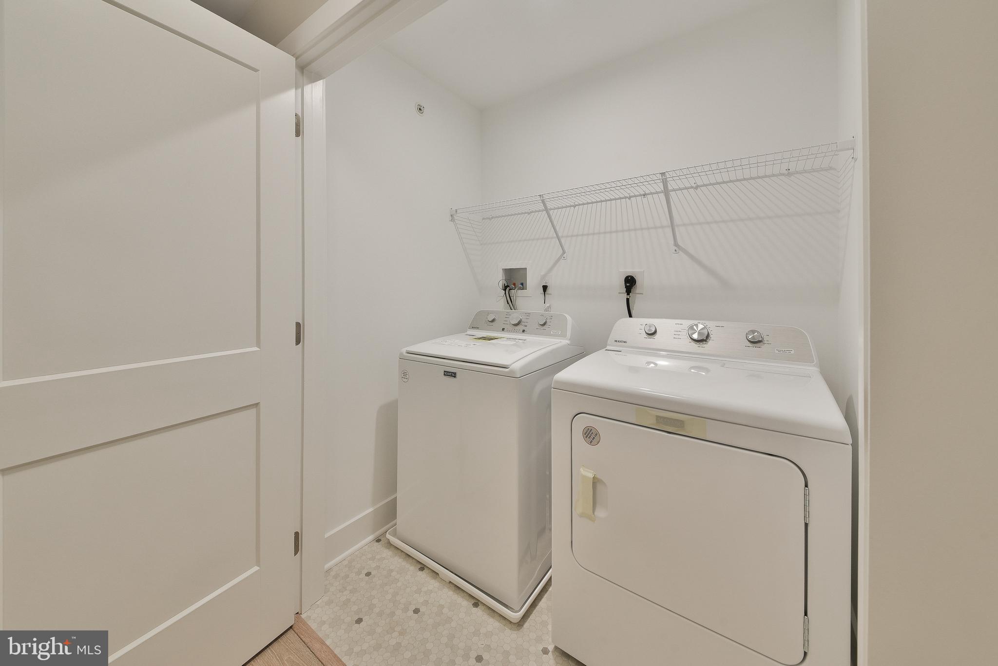 328 Walnut Street Collegeville, PA 19426 - Photo 26 of 35 a utility room with dryer and washer