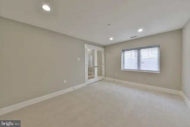 a view of a room with air conditioner duct