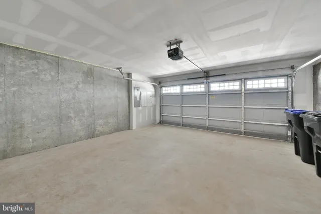 a front view of a house with a garage